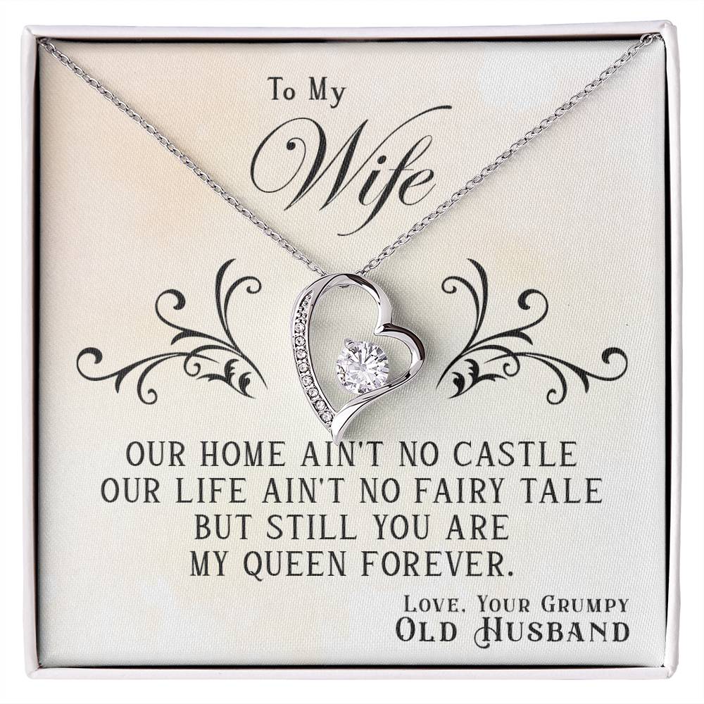 A "To My Wife, You Are My Queen Forever - Forever Love" necklace with a heart pendant, displayed with a message to a wife from her husband, expressing endearment with a playful acknowledgment of imperfection from ShineOn Fulfillment.