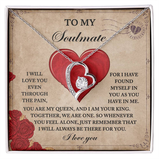 The Soulmate-Found Myself Forever Love Necklace features a heart-shaped pendant that sparkles on a romantic backdrop. Surrounded by roses and a large red heart, it is beautifully highlighted with CZ crystals and a dazzling gold finish.