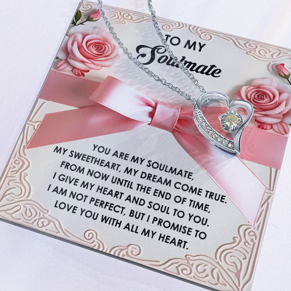 The Soulmate-Heart And Soul - Forever Love Necklace boasts a gold-finished heart pendant on a rose-adorned card with a love message. Accentuated with CZ crystals, it symbolizes eternal affection.