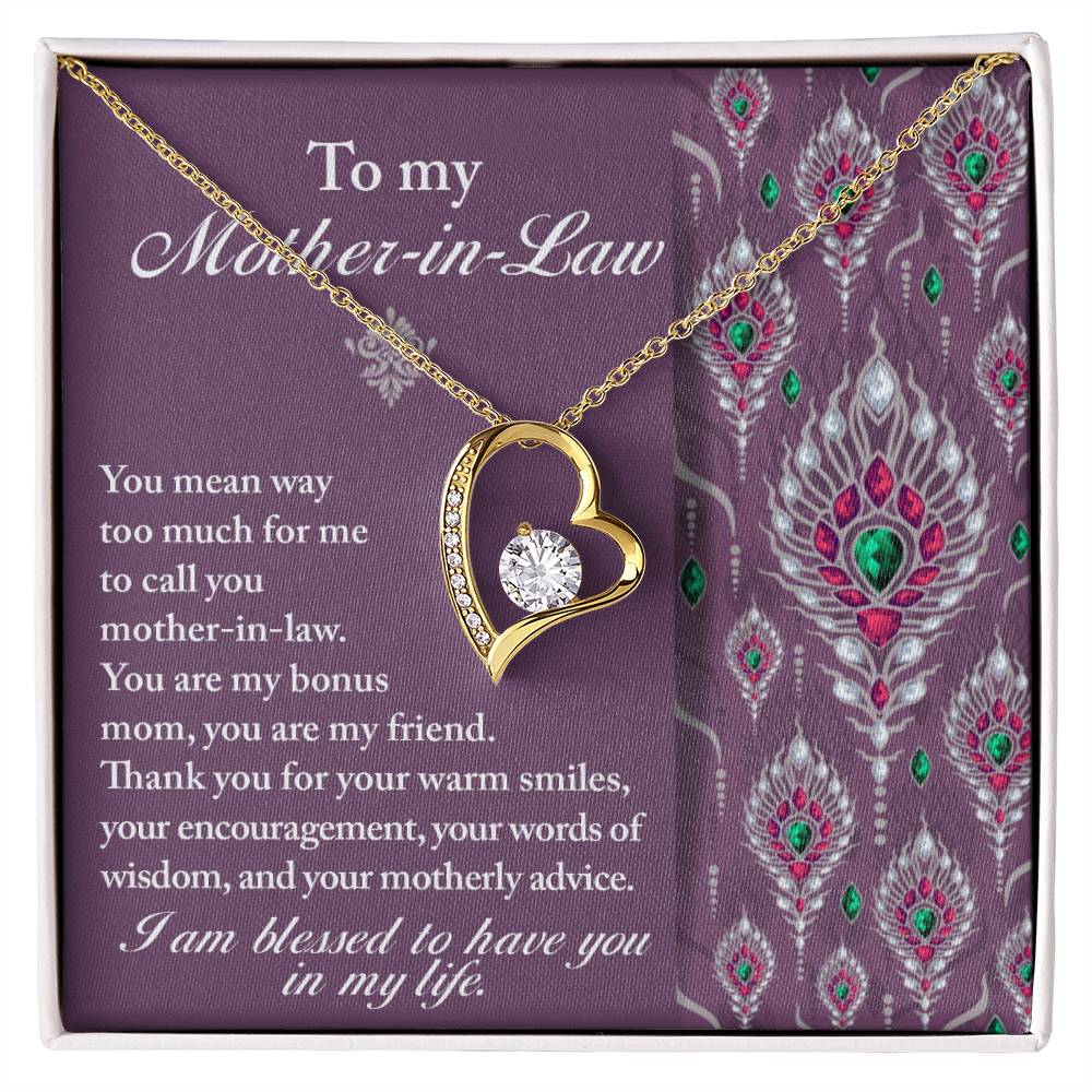 The "To Mother-In-Law, Words Of Wisdom - Forever Love Necklace," featuring a gold heart-shaped pendant with a diamond at its center, is elegantly displayed in a box with a heartfelt message to your mother-in-law against a purple background adorned with a decorative pattern. This necklace beautifully captures the essence of love and appreciation, making it an ideal personalized gift.