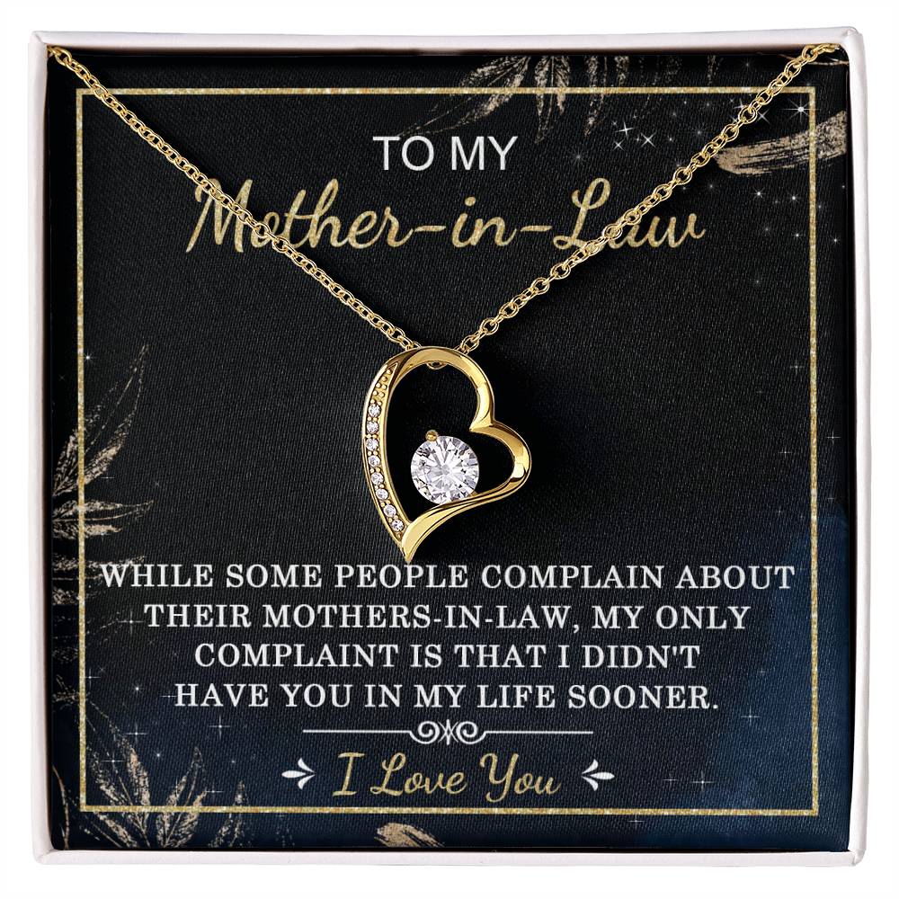 The "To Mother-In-Law, In My Life - Forever Love Necklace" features a heart-shaped pendant with a clear cubic zirconia stone in the center and is displayed against a black background with the message: "To my Mother-in-Law, I didn't have you in my life sooner. I Love You.