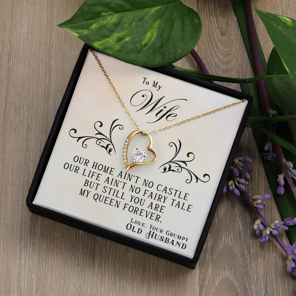 A To My Wife, You Are My Queen Forever Necklace with a gold finish and a cubic zirconia stone, presented in a gift box featuring a romantic note for a wife from her husband.