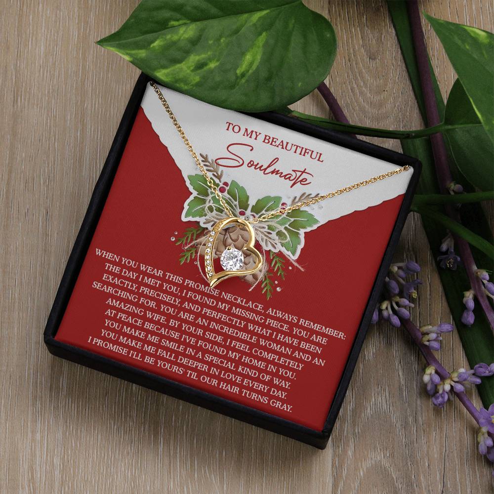 The Soulmate-At Peace - Forever Love Necklace, featuring a gold finish, is elegantly presented in a gift box adorned with a floral background. Its centerpiece, a shimmering CZ crystal, complements the heartfelt message titled "To My Beautiful Soulmate.