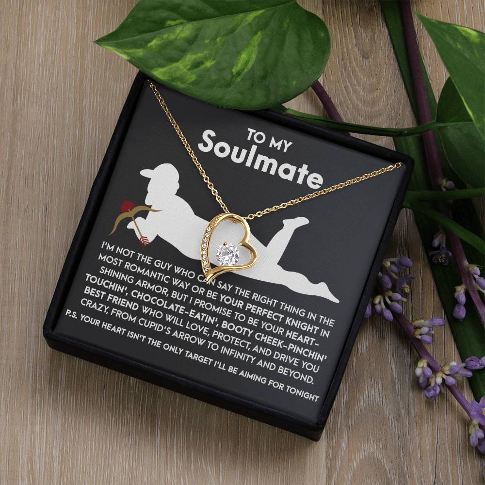 The Soulmate-Cupid's Arrow Forever Love Necklace shines on a black background, featuring an inscription and a silhouette of someone with a rose. Enhanced by purple flowers, the white gold finish accentuates the brilliance of its CZ crystal.