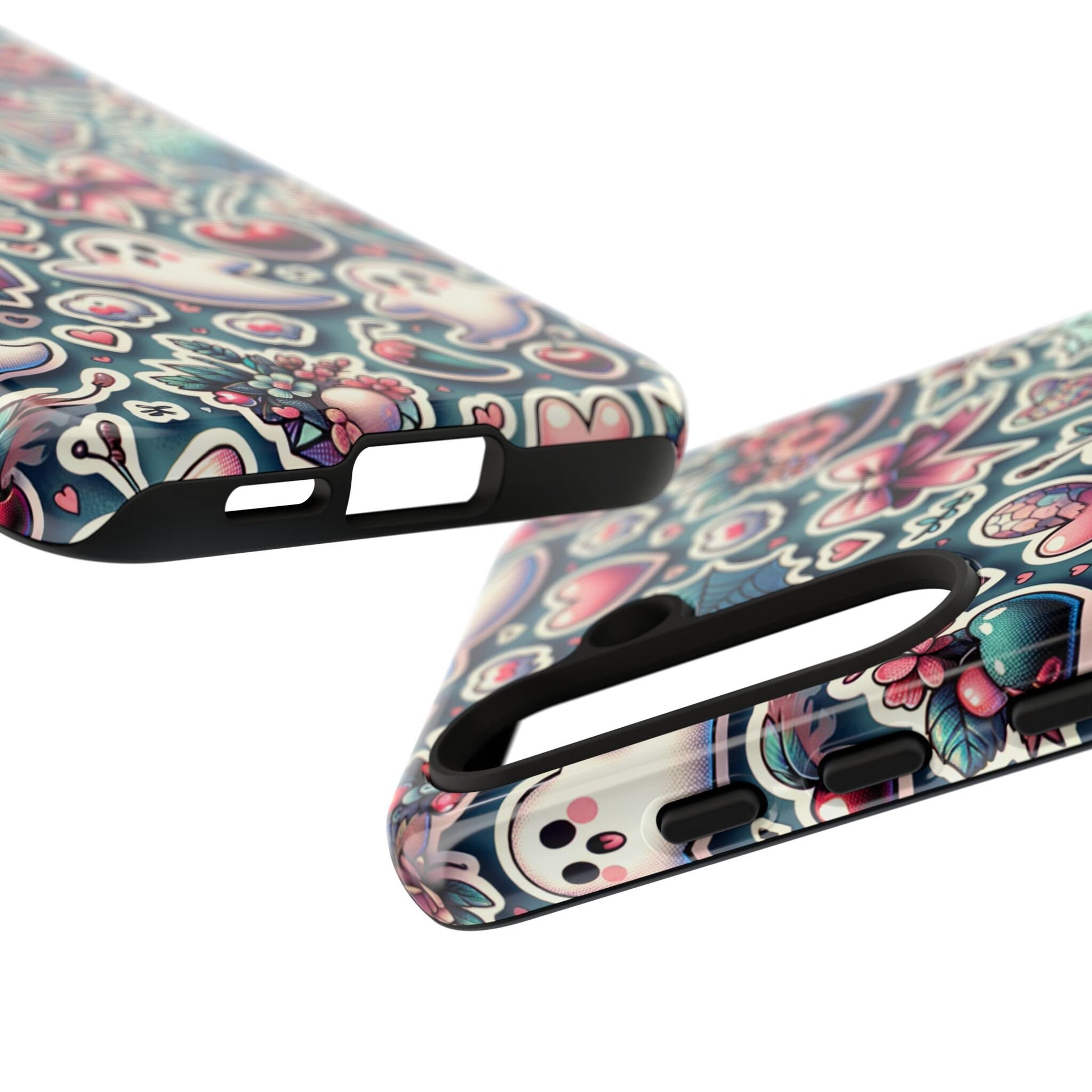 A close-up showcases two phone cases adorned with colorful, whimsical designs of flowers, skulls, and other abstract shapes set against a dark background. The Cute Coquette Halloween Phone Case perfectly merges the charm of coquette style with a soft girl aesthetic, creating a playful yet edgy look.