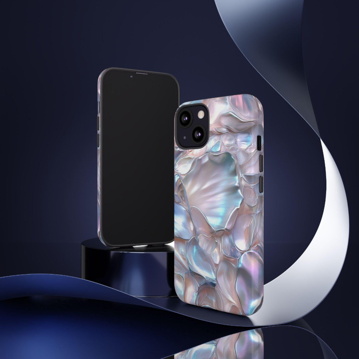Two smartphones with June Birthstone Mother of Pearl phone cases rest on a dark, glossy surface, accentuated by a curved ribbon in the background, highlighting a design inspired by the elegance of pearls.