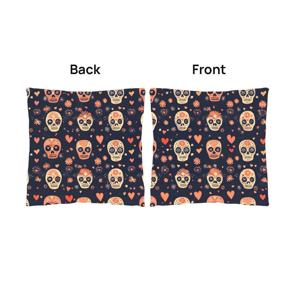 The Day of the Dead Mexican Skull Pillow is a perfect spooky decorative piece for skull lovers. This pillow showcases front and back views with a vibrant sugar skull design adorned with colorful flowers and hearts on a dark background, adding a festive touch to your space.