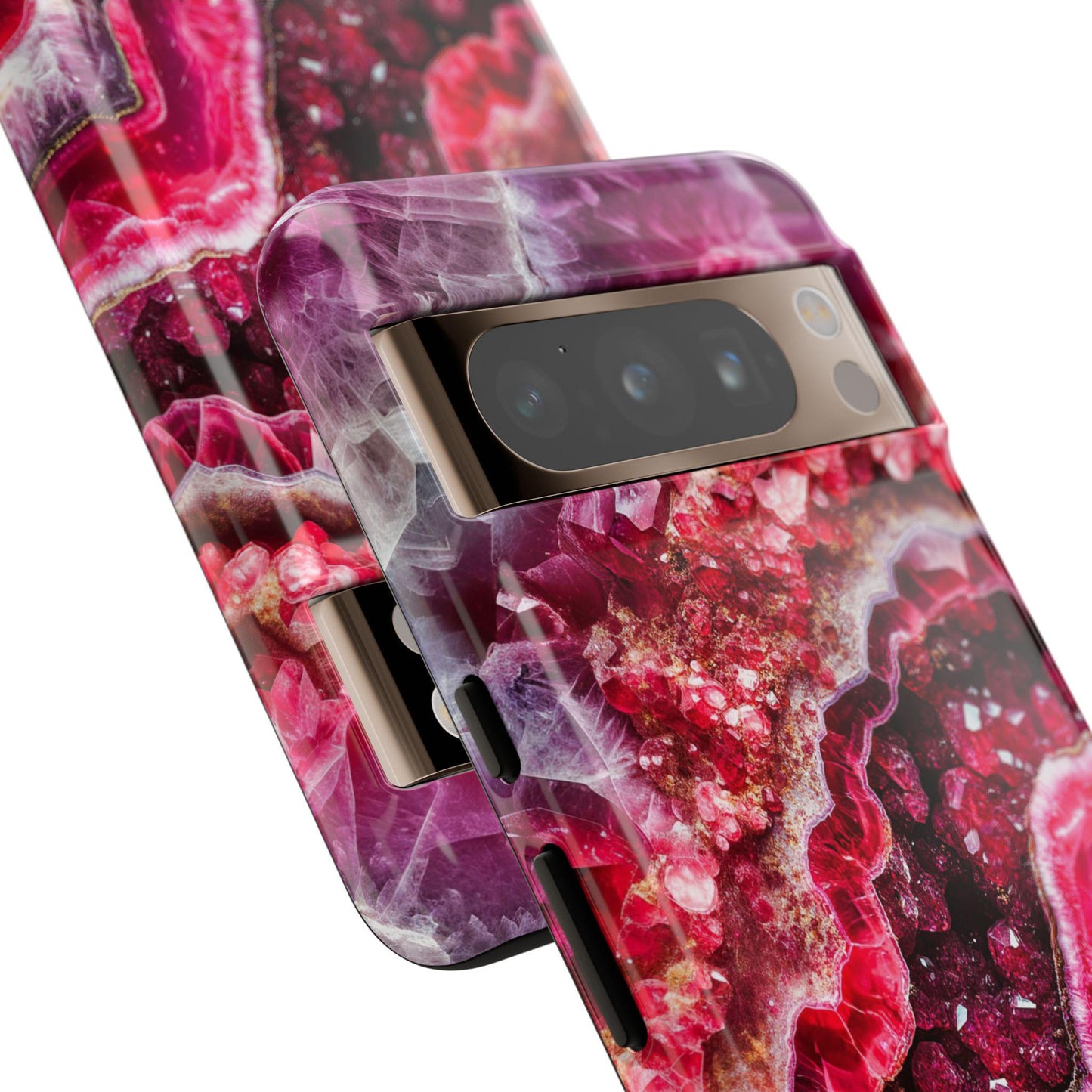 Two smartphones with July Birthstone Ruby Crystal Geode Design Phone Cases, featuring vibrant patterns for iPhone models 15, 14, and 13, as well as Samsung and Google Pixel models, showcasing multiple camera lenses.
