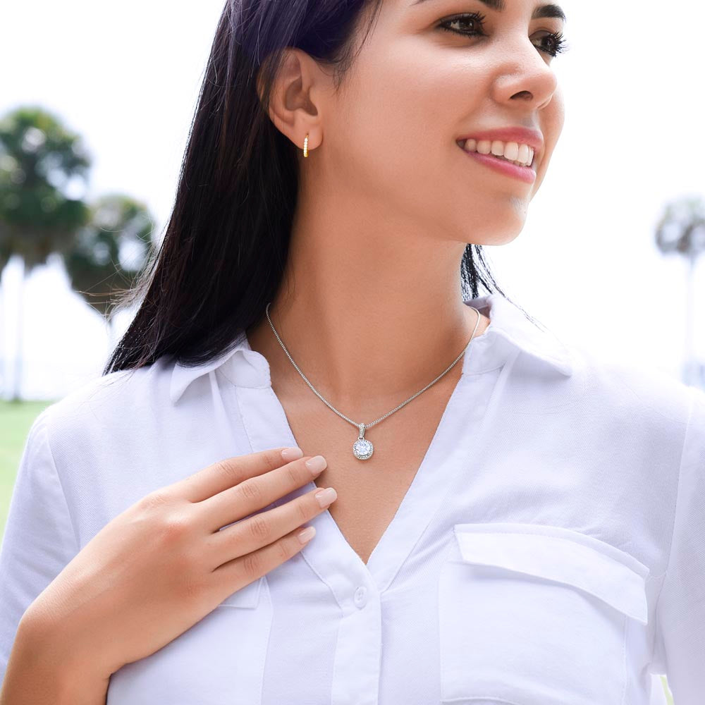 A woman wearing a white shirt and a ShineOn Fulfillment "I Love You Forever And Always Eternal Hope Necklace - Gift for Daughter from Mom".