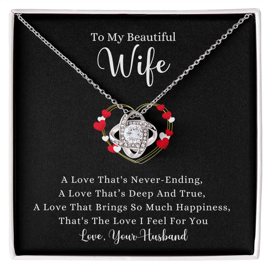 A box with a A Love That's Never-Ending Love Knot Necklace - For Wife by ShineOn Fulfillment that says to my beautiful wife.