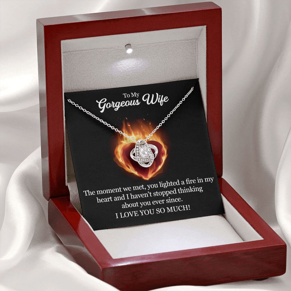 A The Moment We Met Love Knot Necklace - To Wife from Husband heart shaped necklace in a wooden box with a message on it by ShineOn Fulfillment.