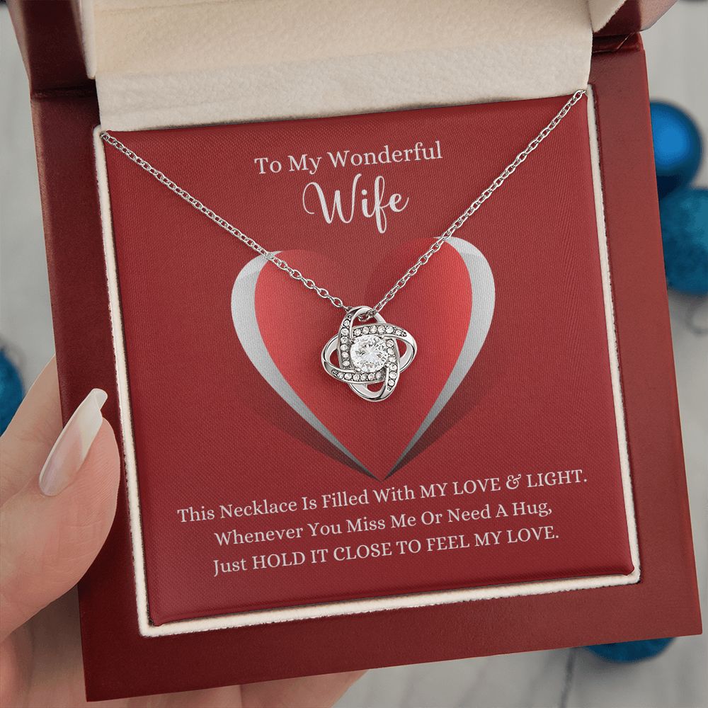 A gift box with the ShineOn Fulfillment This Necklace Is Filled with My Love & Light Love Knot Necklace - For Wife that says to my wonderful wife.