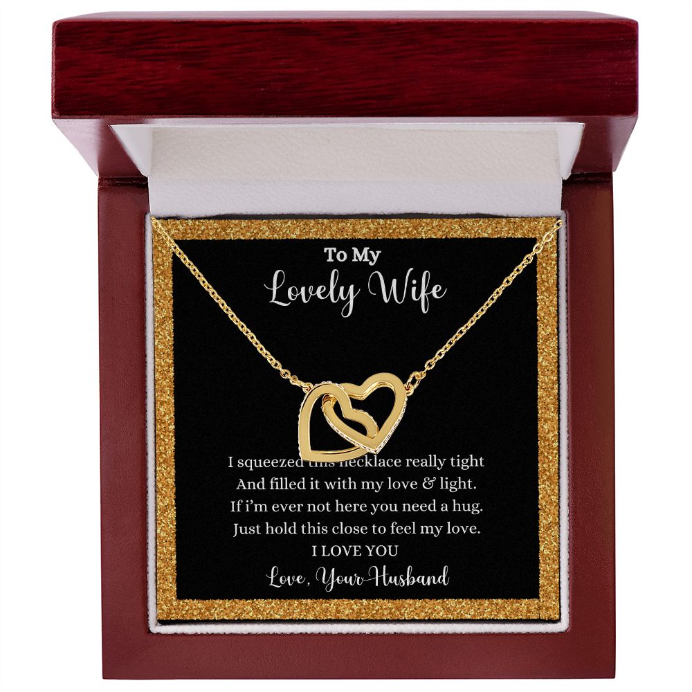 A ShineOn Fulfillment Interlocking Hearts Necklace - Gift for Wife from Husband with a poem on it that says to my lovely wife.