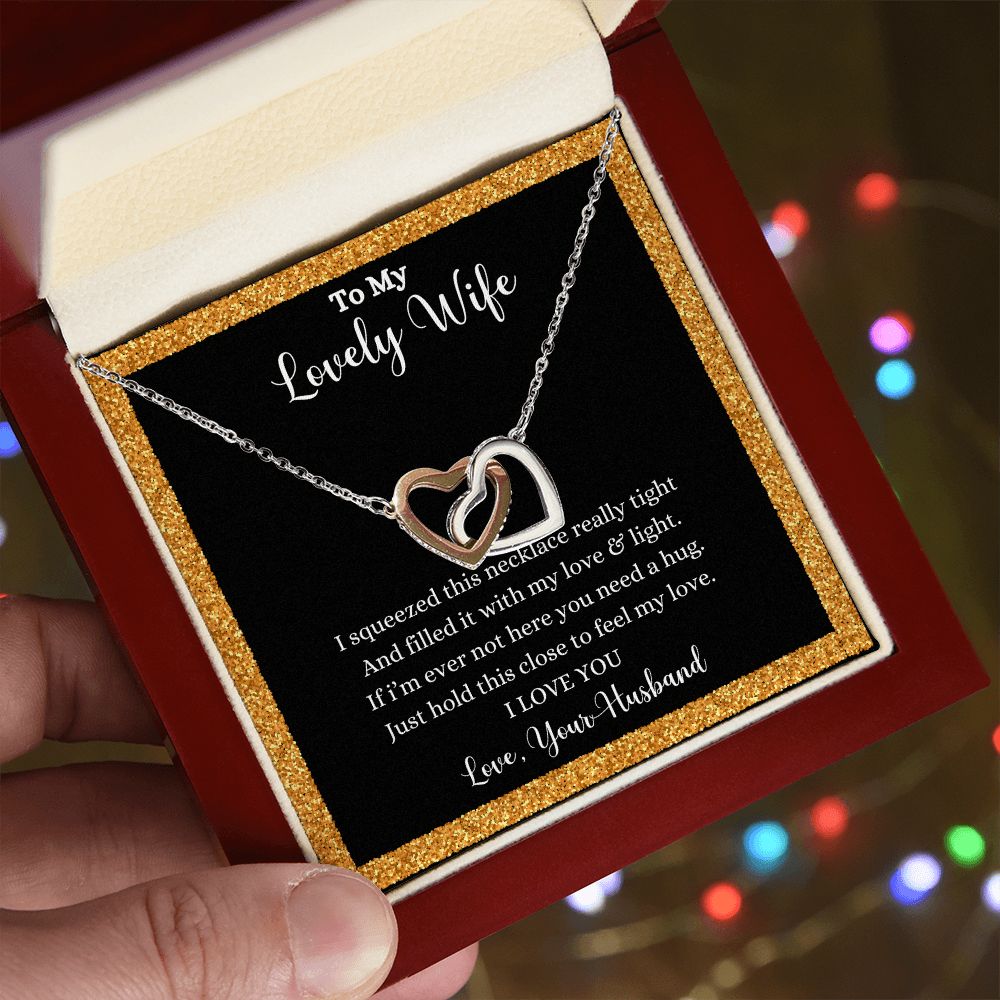 A ShineOn Fulfillment gift box with the I Love You Interlocking Hearts Necklace - Gift for Wife from Husband in it.