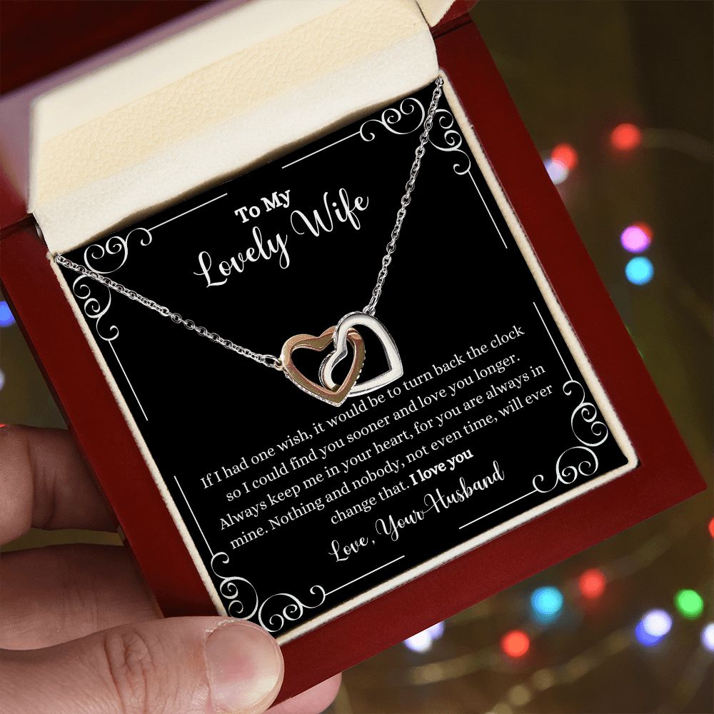 A gift box with the I Love You Interlocking Hearts Necklace from ShineOn Fulfillment in it.