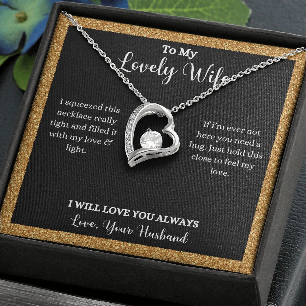 A gift box with the "I Love You Forever Love Necklace - Gift for Wife from Husband" by ShineOn Fulfillment that says to my lovely wife.