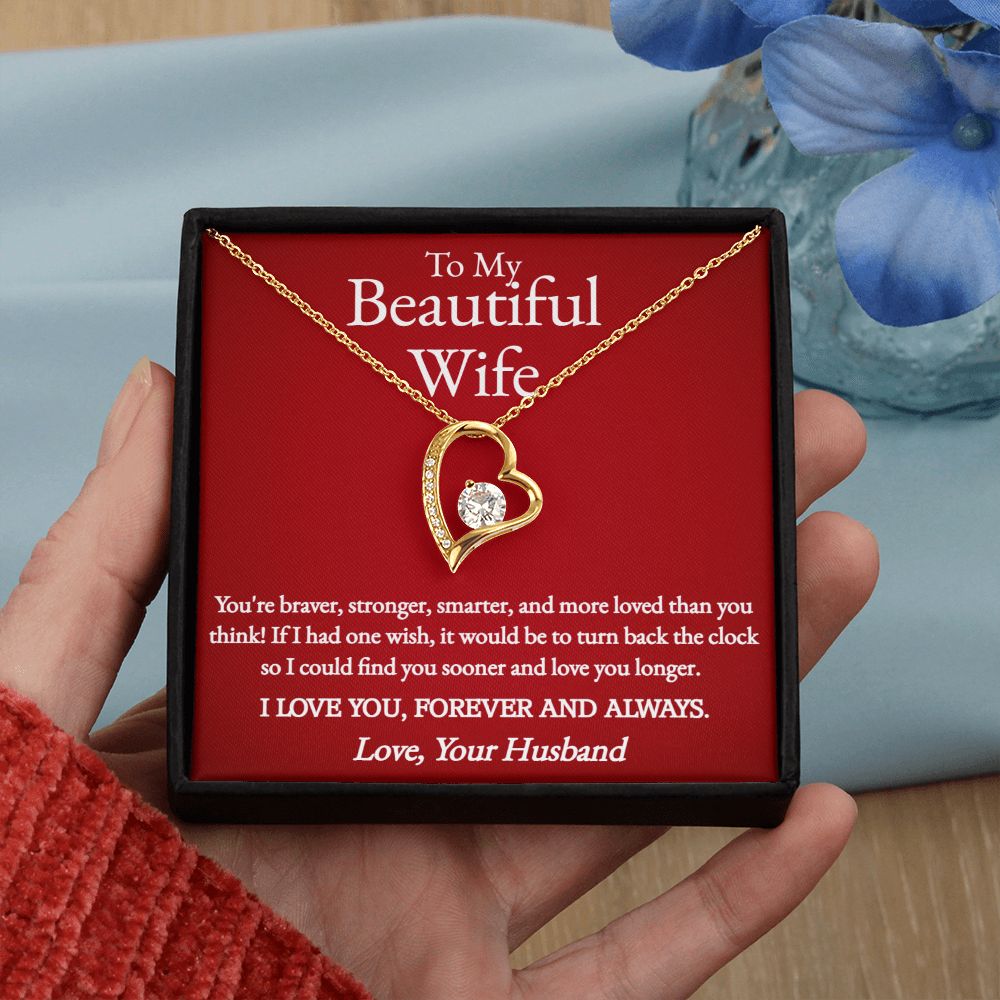 A woman holding a You Are Braver Forever Love Necklace - To Wife from Husband by ShineOn Fulfillment that says i am a beautiful wife.
