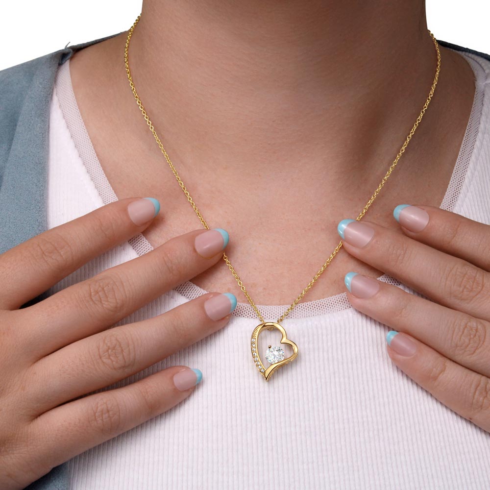 A woman wearing a You Complete Me Forever Love Necklace - To Wife from Husband pendant by ShineOn Fulfillment.