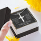 A person holding a I Will Always Love You To Infinity Artisan Cross Necklace – For Husband by ShineOn Fulfillment in a gift box.