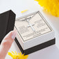 A person holding a You Are The Best Thing In My Life Artisan Cross Necklace – For Husband by ShineOn Fulfillment in a gift box.