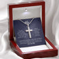 A gift box with the You Are Everything To Me Artisan Cross Necklace – For Husband from ShineOn Fulfillment and a card in it.