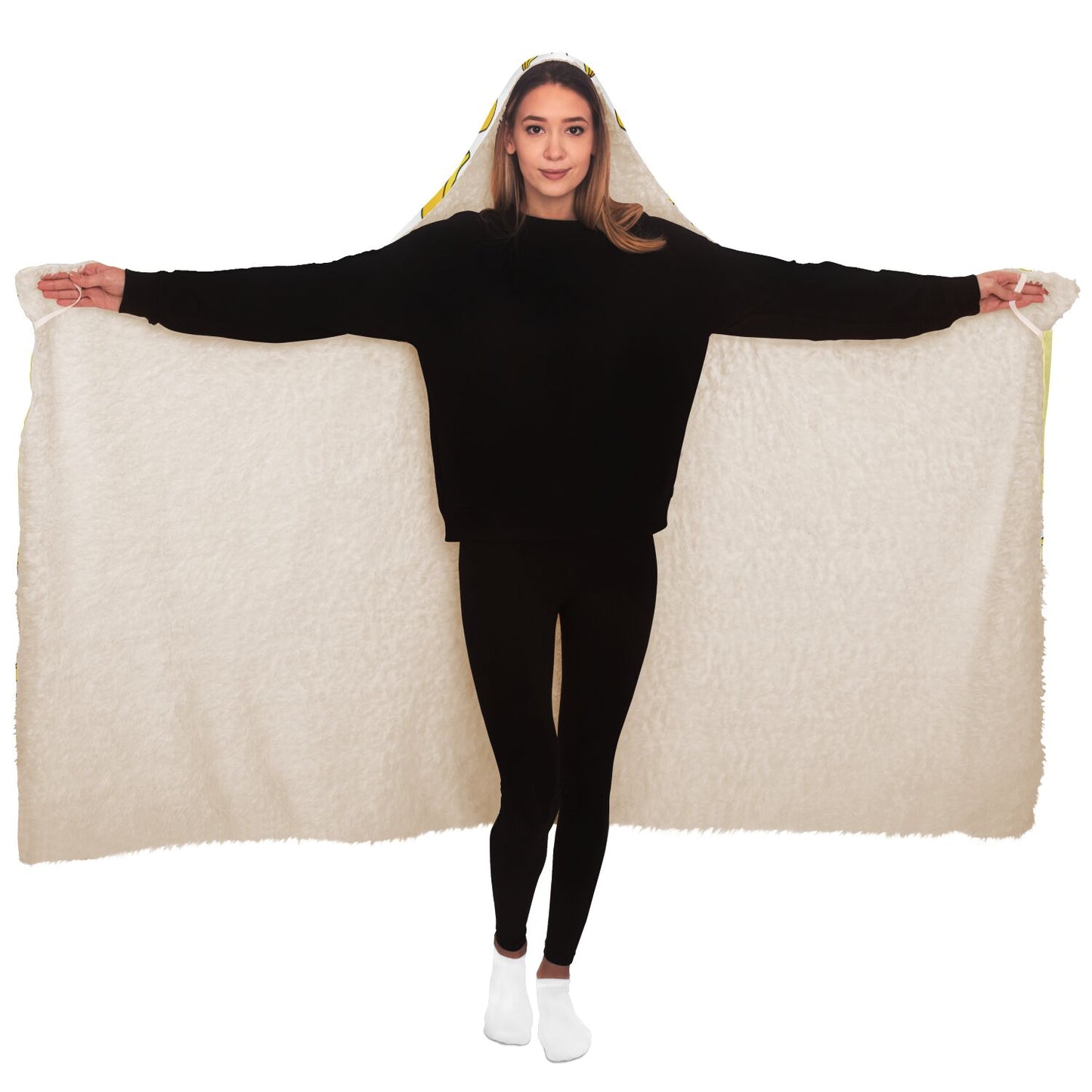 A woman draped in a Nana You're The Best Blanket Hoodie with Banana Pattern.