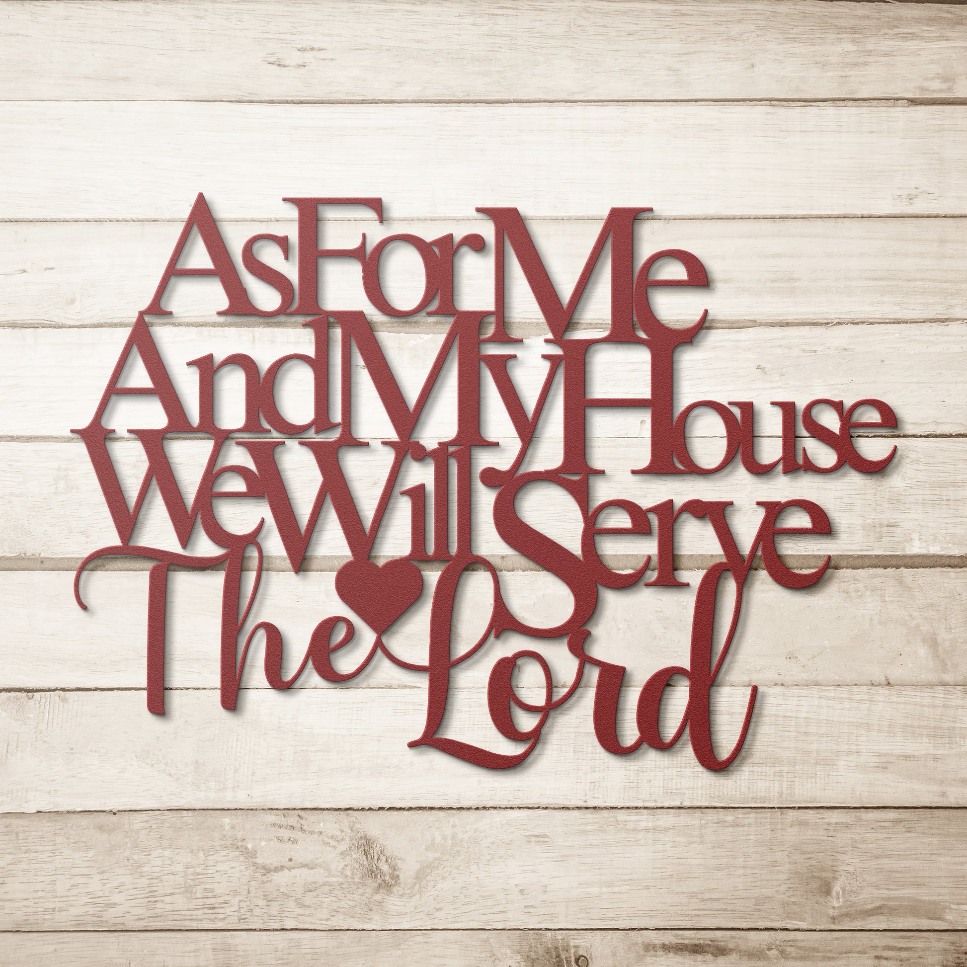 The "As for Me and My House, We Will Serve the Lord Christian Metal Art" features black text on a white background that reads, "As For Me And My House We Will Serve The Lord," with a heart shape incorporated into the word "Lord." Crafted from 18 gauge steel, this elegant metal sign makes a perfect piece of home decor.