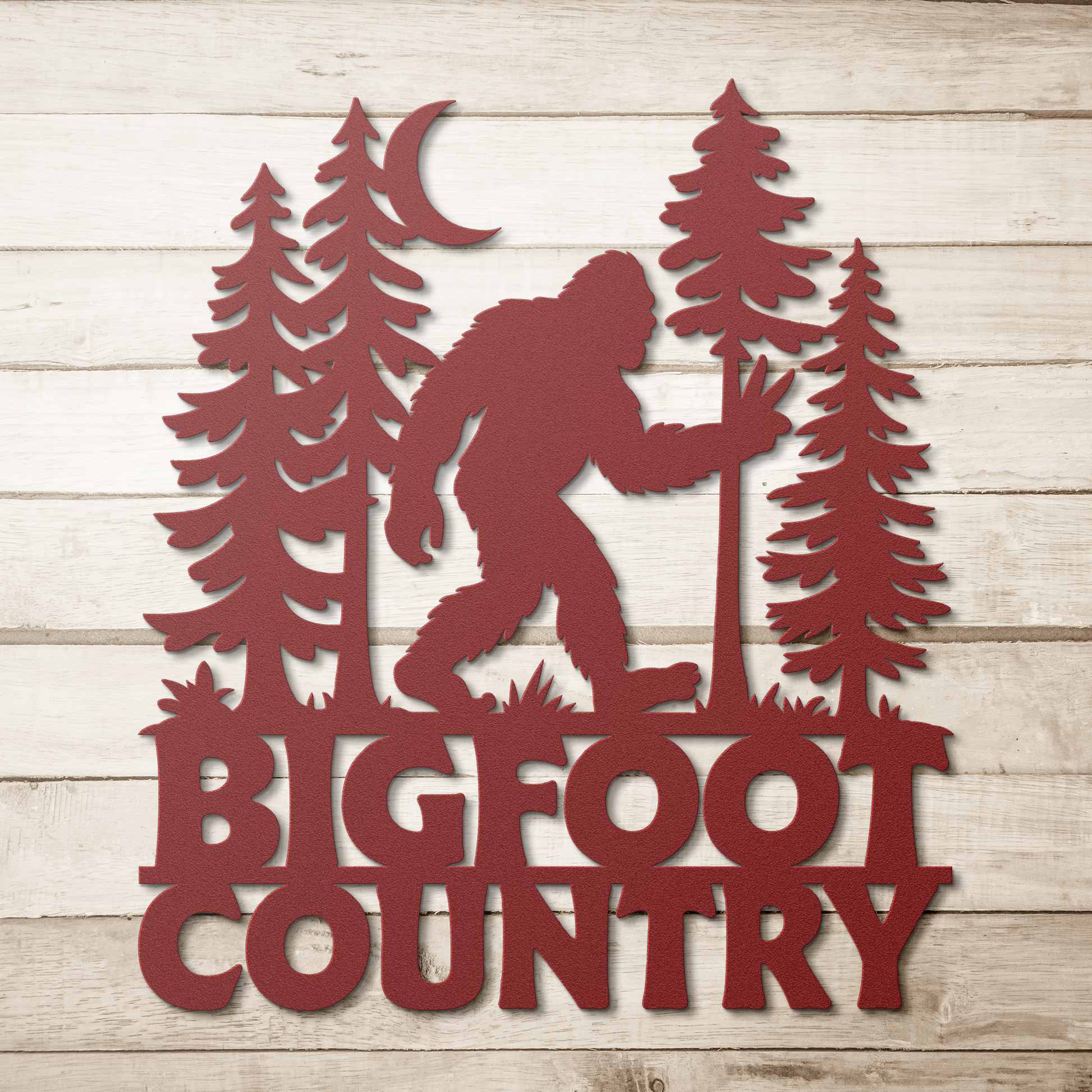 Bigfoot_Country_Metal_Wall_Art_Red_Simple_Wood_BKGD_Mockup.png
