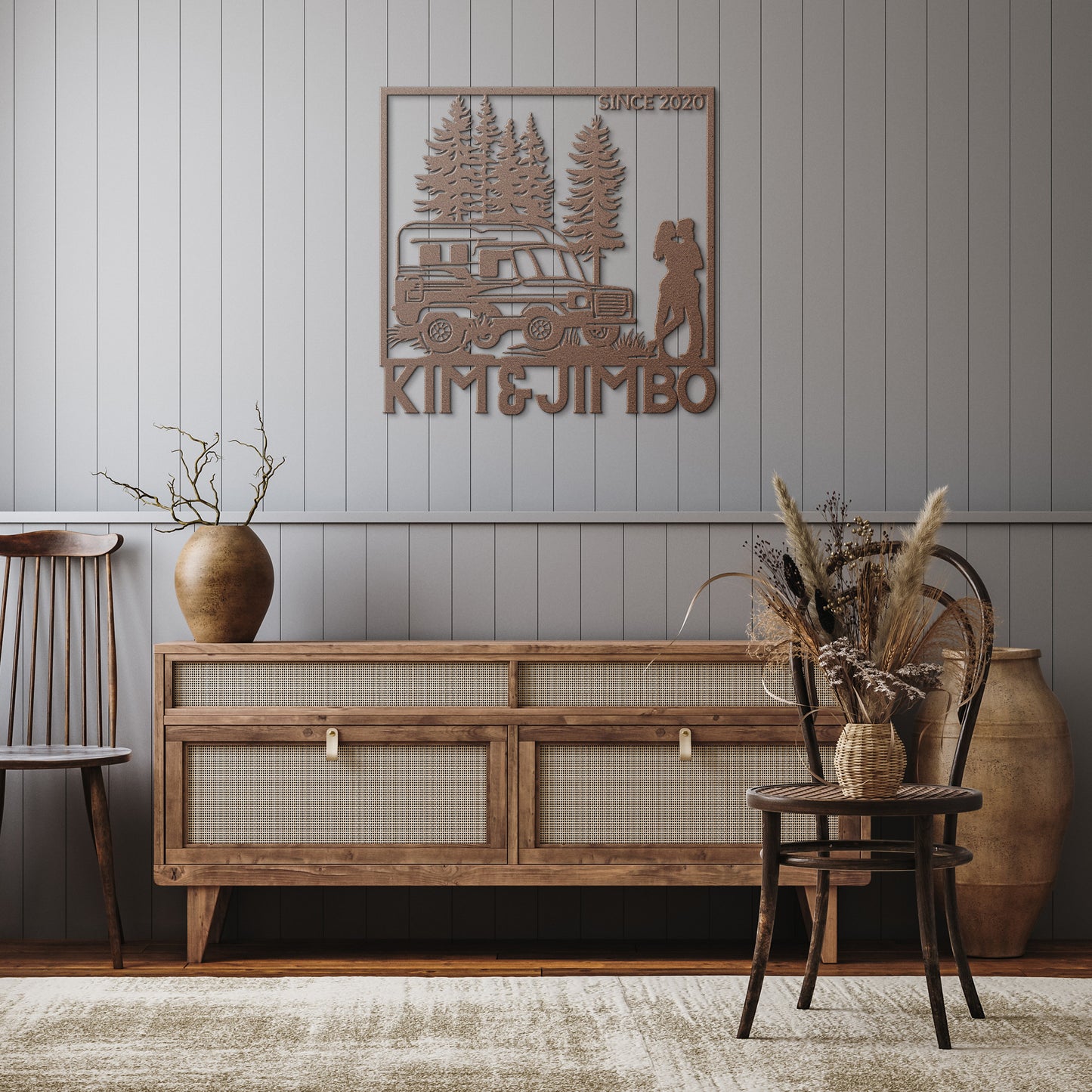 Silhouette of a couple kissing next to a camper van with trees in the background. Text reads "KIM & JIMBO" and "SINCE 2020". The Custom Camping Couple Metal Art, crafted from durable 18 gauge steel, makes for perfect home decor.