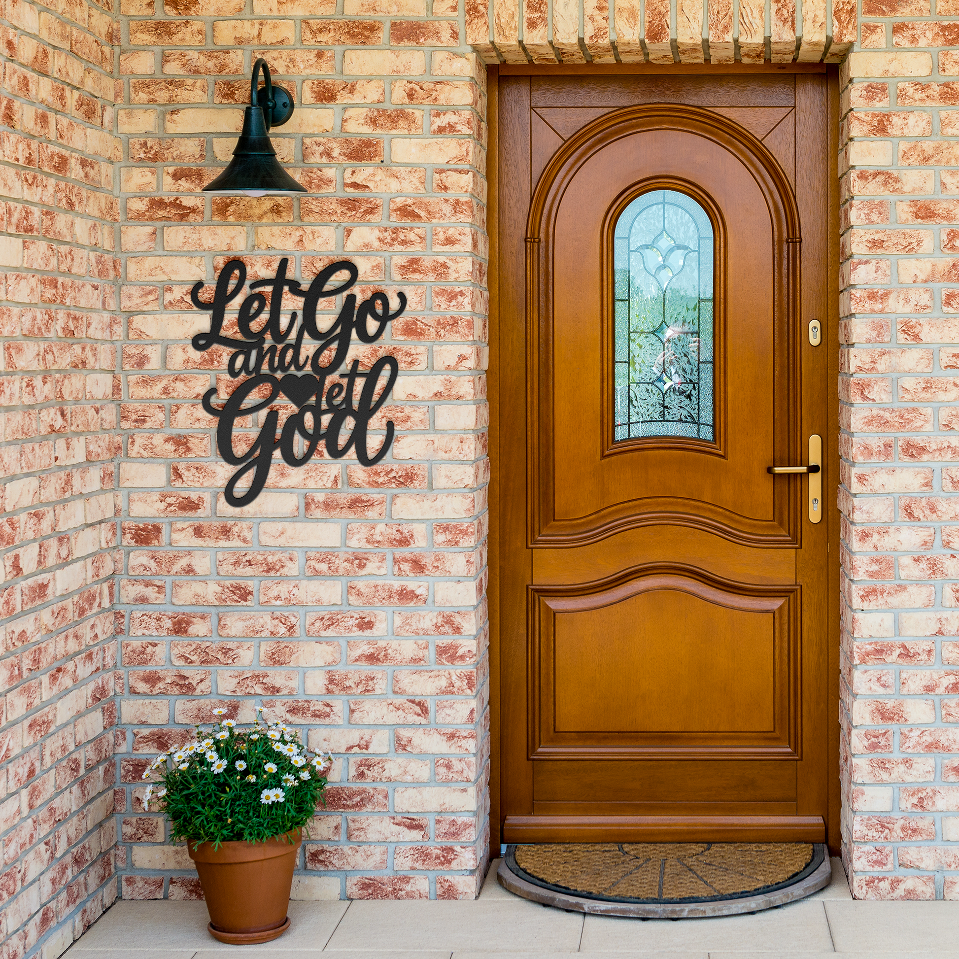Christian_Metal_Art_-_Let_Go_and_Let_God_Black_Brick_Entrance_Mockup.png