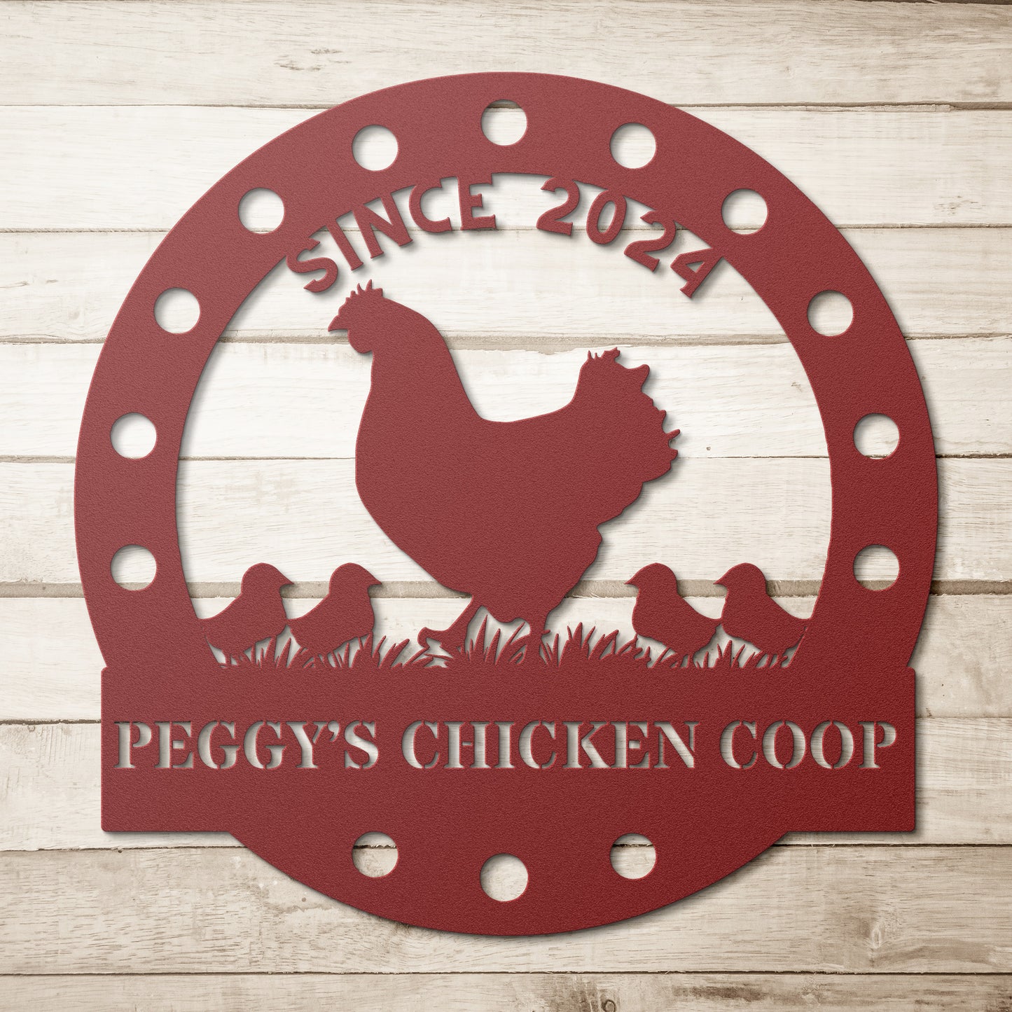 The Custom Chicken Coop Metal Sign is crafted from 18 gauge red steel, featuring a charming silhouette of a chicken and chicks on grass. It reads "Since 2024 Peggy's Chicken Coop" and is perfect for adding rustic charm to your home decor.