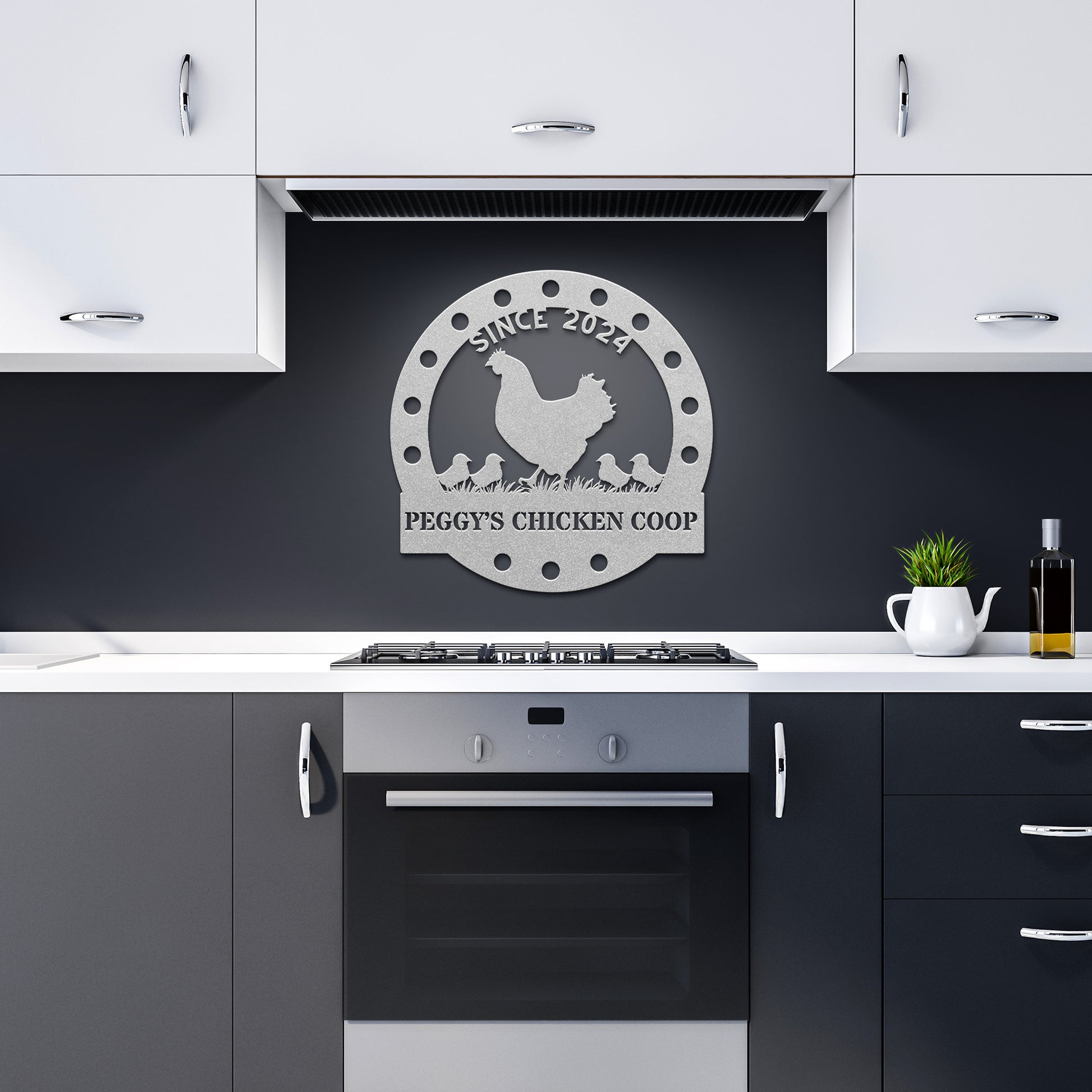 A modern kitchen with monochrome cabinets and an oven is beautifully complemented by the Custom Chicken Coop Metal Sign, which showcases a powder-coated metal design that reads "Since 2024 Peggy's Chicken Coop" along with a charming chicken motif on the wall.