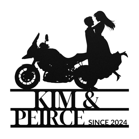 Custom Motorcycle Couple Metal Wall Art of a couple kissing on a motorcycle, crafted from 18 gauge steel, above text "kim & peirce since 2024".