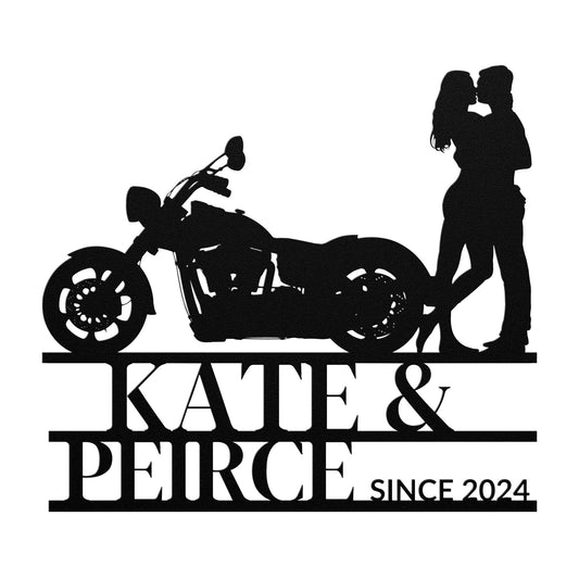 Silhouette of a couple kissing beside a Custom Motorcycle Couple Metal Wall Art, with the names "Kate & Peirce" and "since 2024" below them.