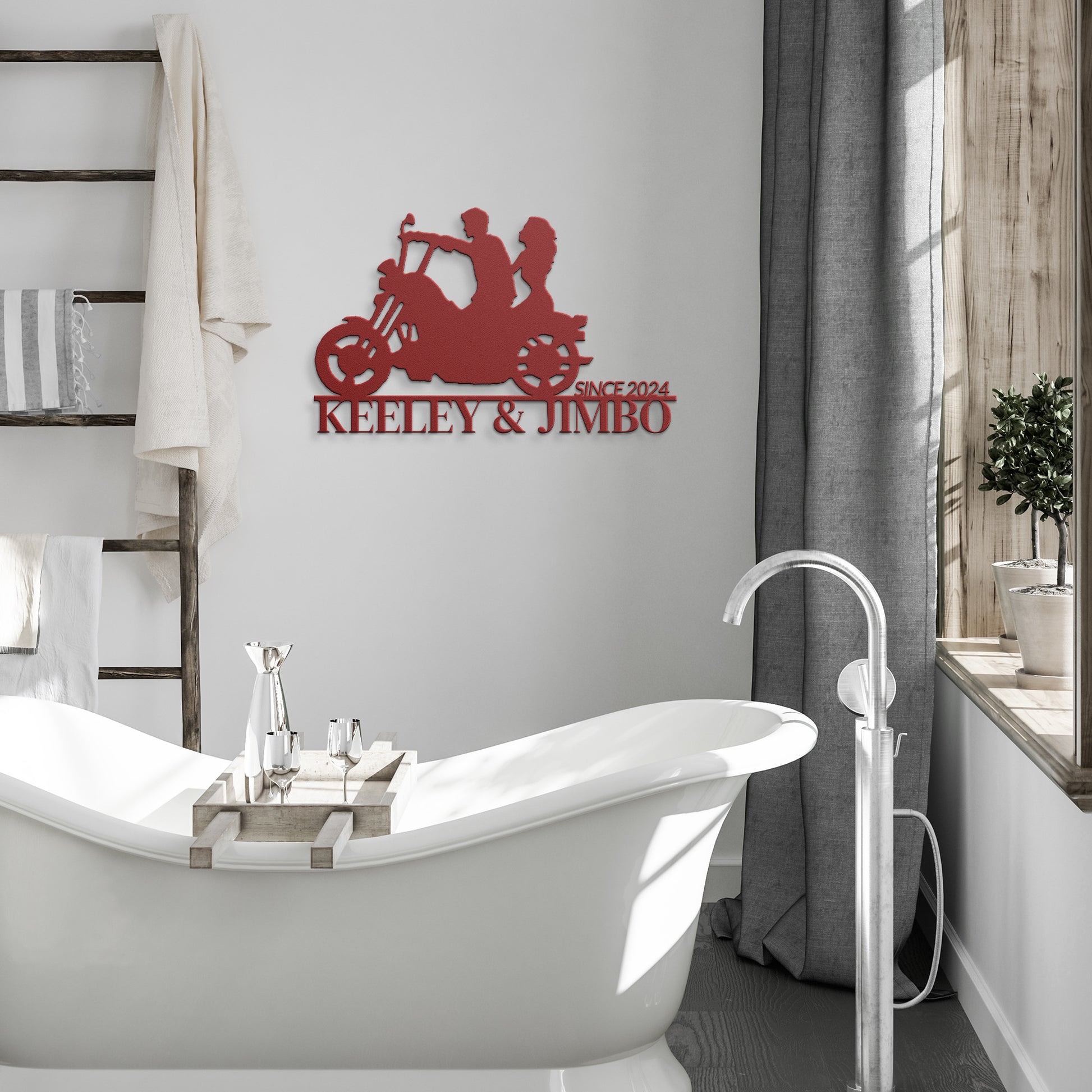 Silhouette of a couple riding a motorcycle with the text "KEELEY & JIMBO" and "SINCE 2024" below them, crafted from premium 18 gauge steel. This striking Custom Motorcycle Couple Metallic Wall Art makes for perfect home decor.

