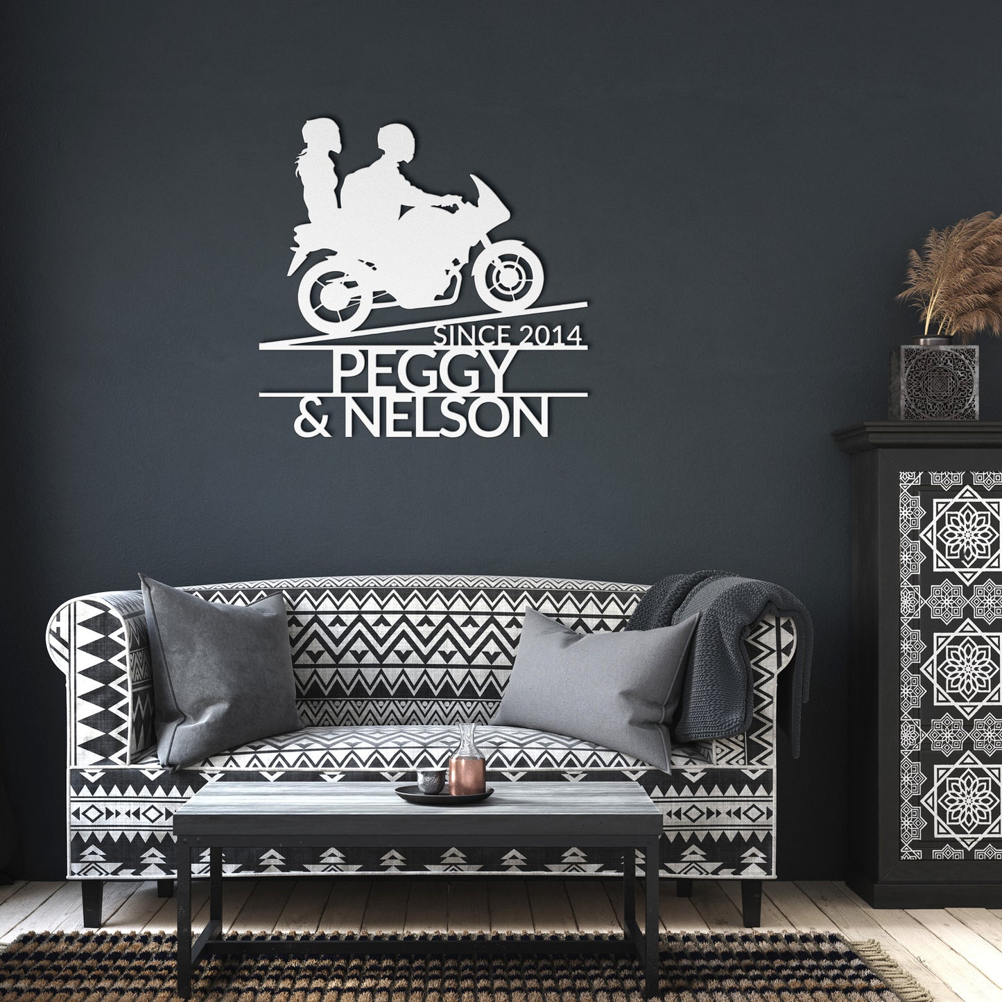 A black Custom Motorcycle Couple Metallic Wall Art featuring a couple riding together on a racer bike uphill, personalized with the names Peggy and Nelson and established year since 2014.