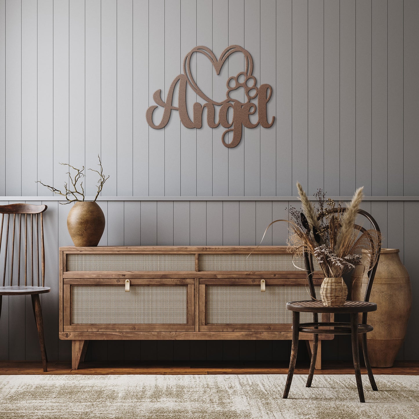 A wooden door with a glass panel in the center is set in a brick wall. To the left of the door is a potted plant with white flowers, and an 18 gauge steel sign that reads "Angel" with a heart and pawprint adds charm to the home decor. This unique touch is provided by the Custom Pet Name Metal Sign with Heart and Paw.