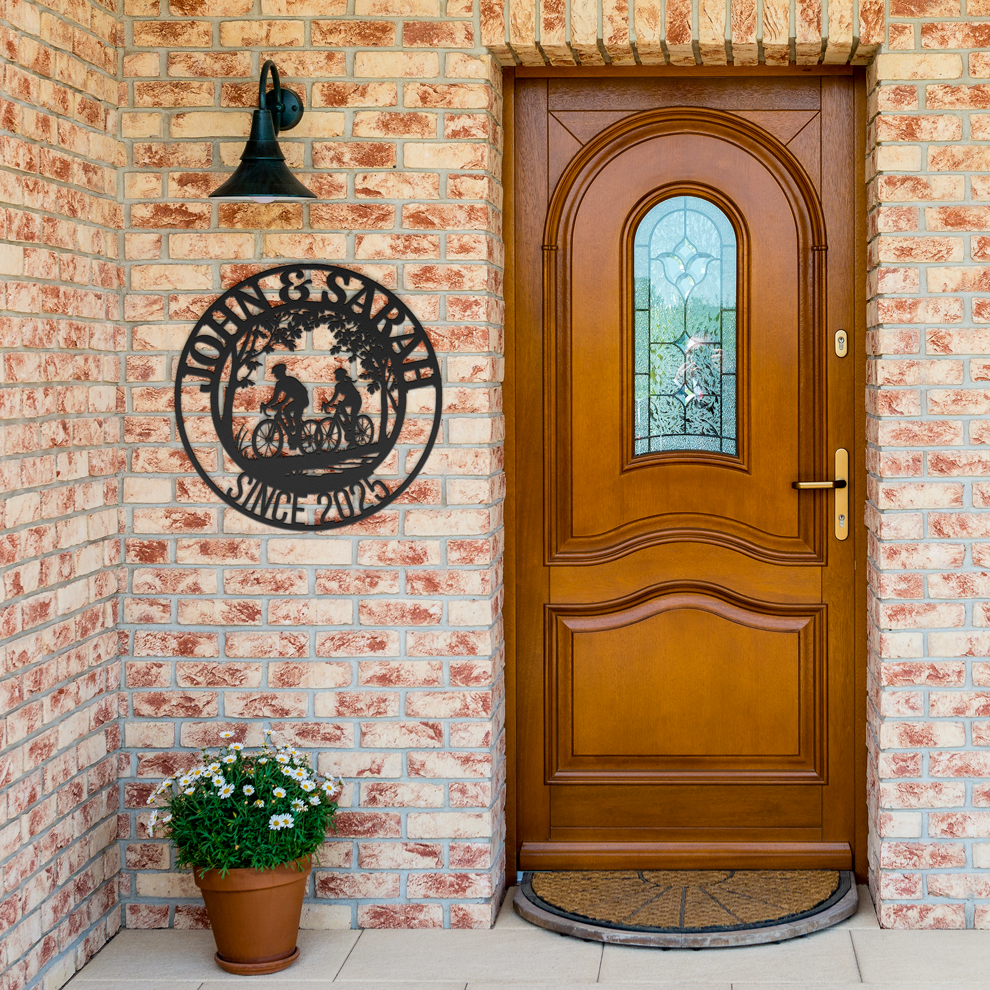 Cycling_Couple_in_outdoor_trail_Black_Brick_Entrance_Mockup.png