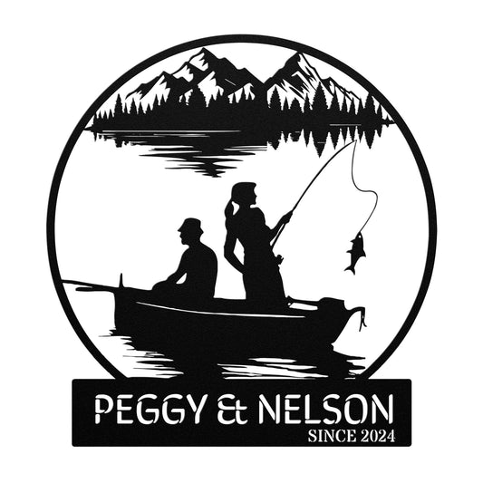 The Fishing Couple Metal Sign features a silhouette of two people fishing in a boat with mountains, crafted from 18-gauge steel. It includes the text "Peggy & Nelson Since 2024" and is an ideal addition to your home decor.