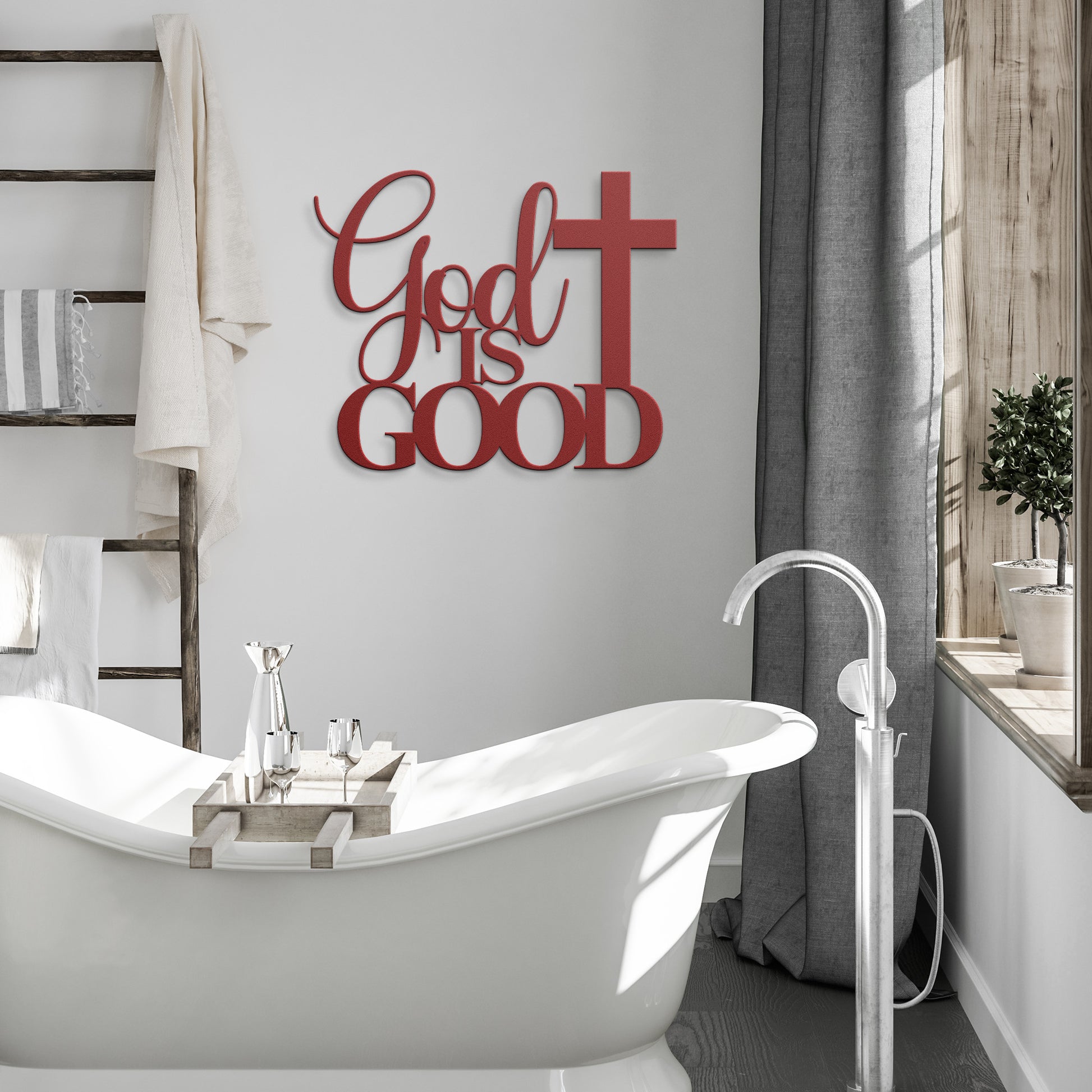 A brown wooden door with decorative glass is set in a brick wall. A potted plant sits beside it, and a stylish powder-coated sign "God Is Good Christian Metal Art" next to a cross enhances the decor. A black outdoor lamp hangs above the sign, completing the charming home decor scene.