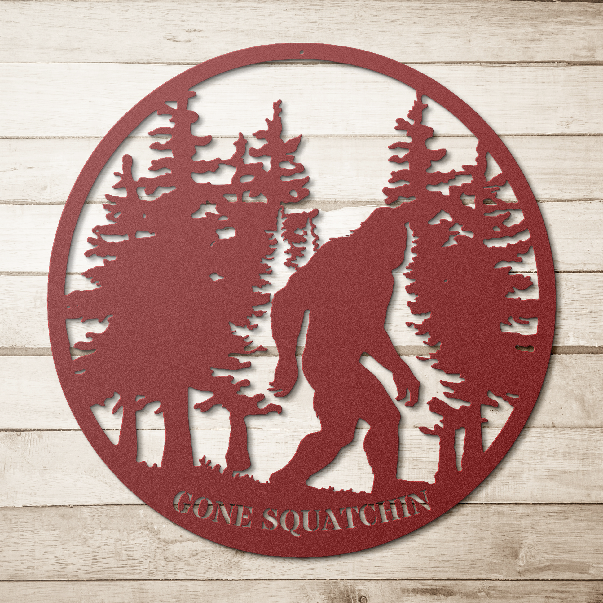Gone_Squatchin_Bigfoot_Metal_Sign_Red_Simple_Wood_BKGD_Mockup.png