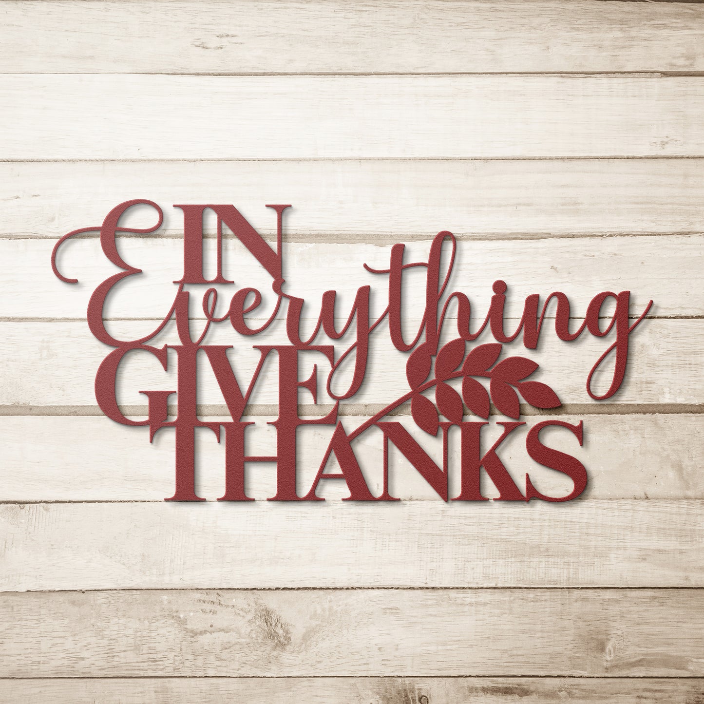 Text on the "In Everything Give Thanks Christian Metal Art" powder-coated metal sign features a leaf design, making it perfect for your home decor.