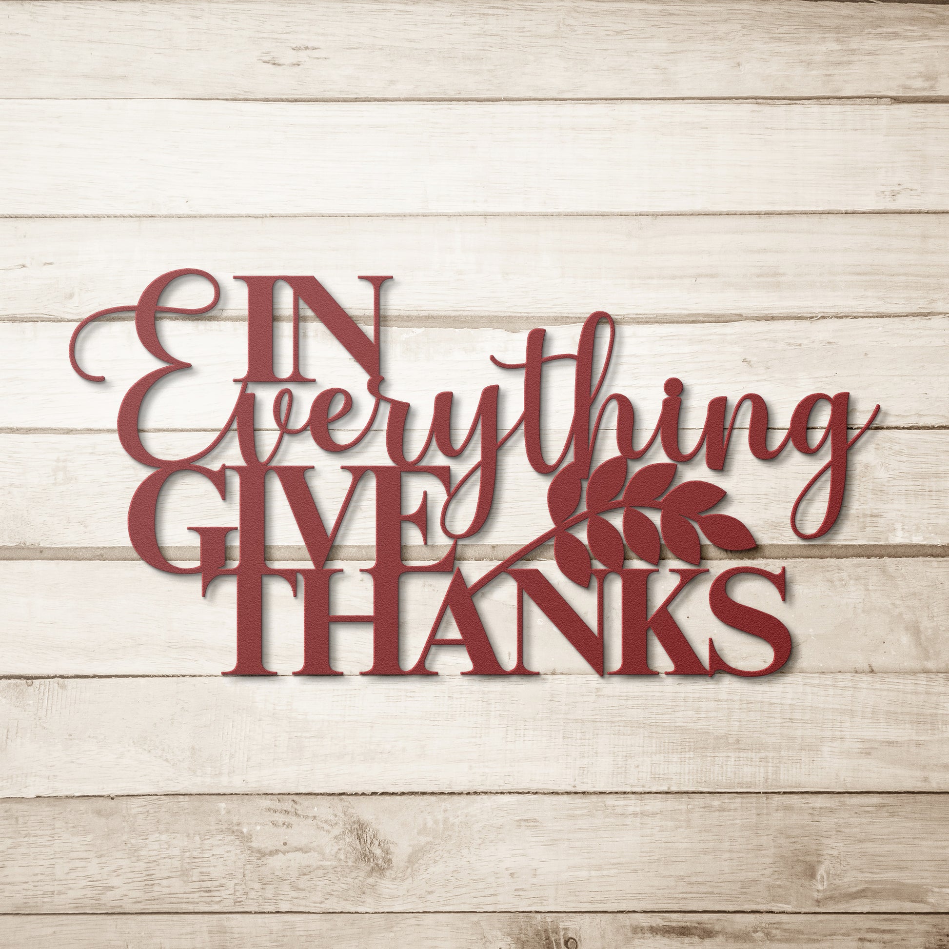 Text on the "In Everything Give Thanks Christian Metal Art" powder-coated metal sign features a leaf design, making it perfect for your home decor.