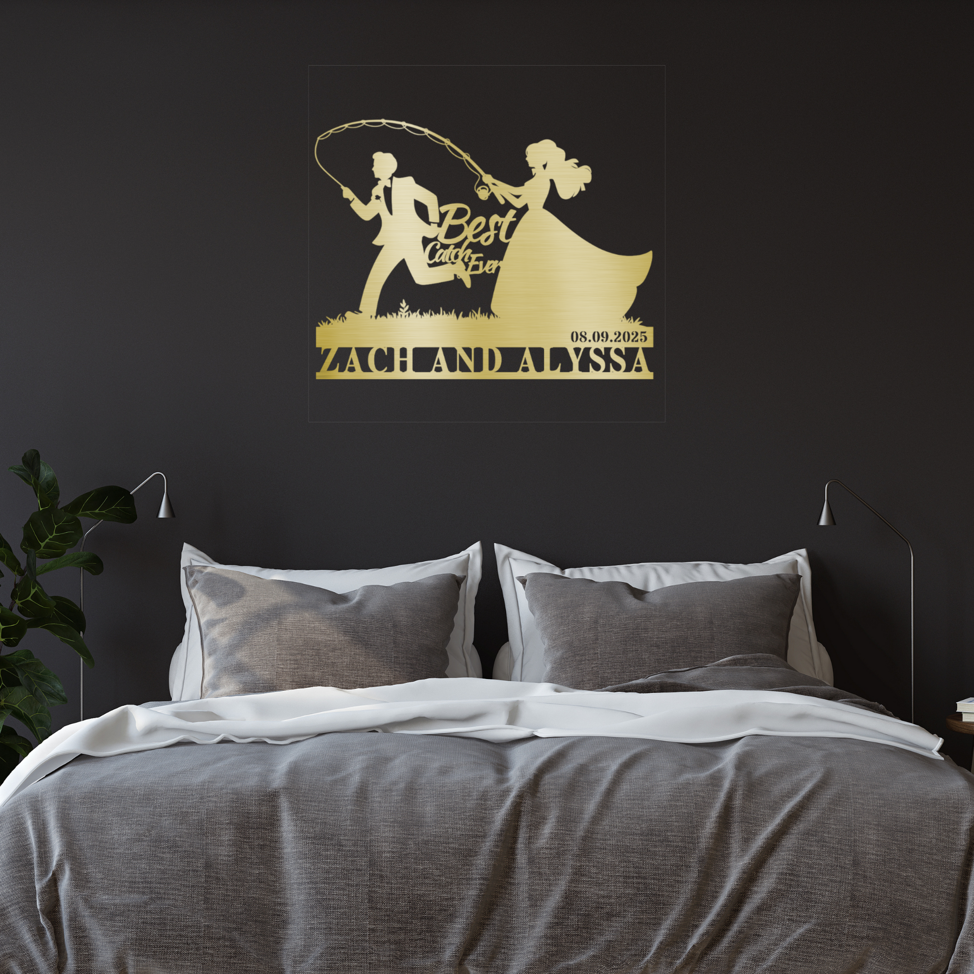 A bedroom with a neatly made bed in gray and white bedding. Above the bed is a Custom Fishing Couple Wedding Metal Wall Art featuring a bride and groom, "Best Day Ever," "08.09.2025," and the names "Zach and Alyssa.