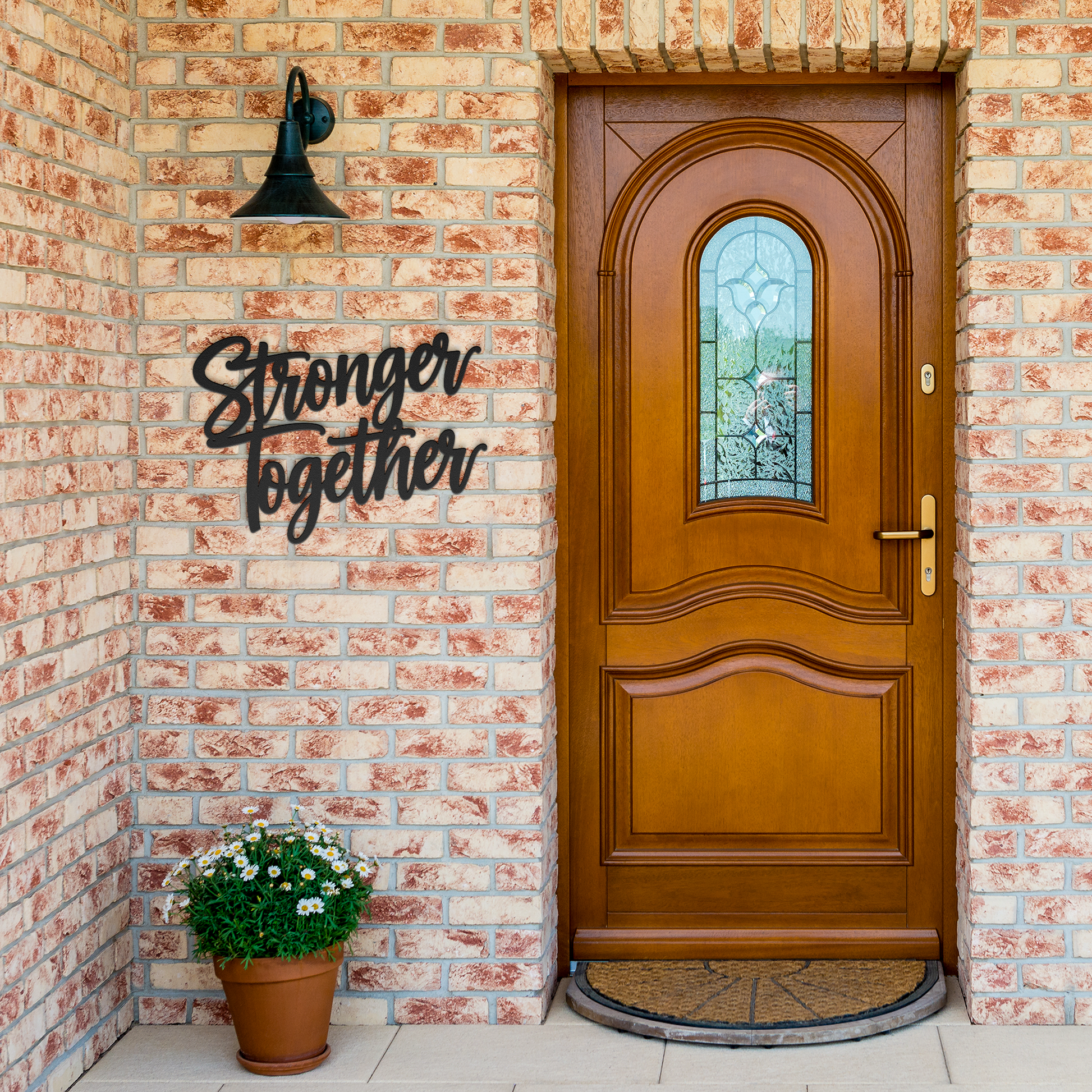 Stronger_Together_Metal_Sign_Black_Brick_Entrance_Mockup.png
