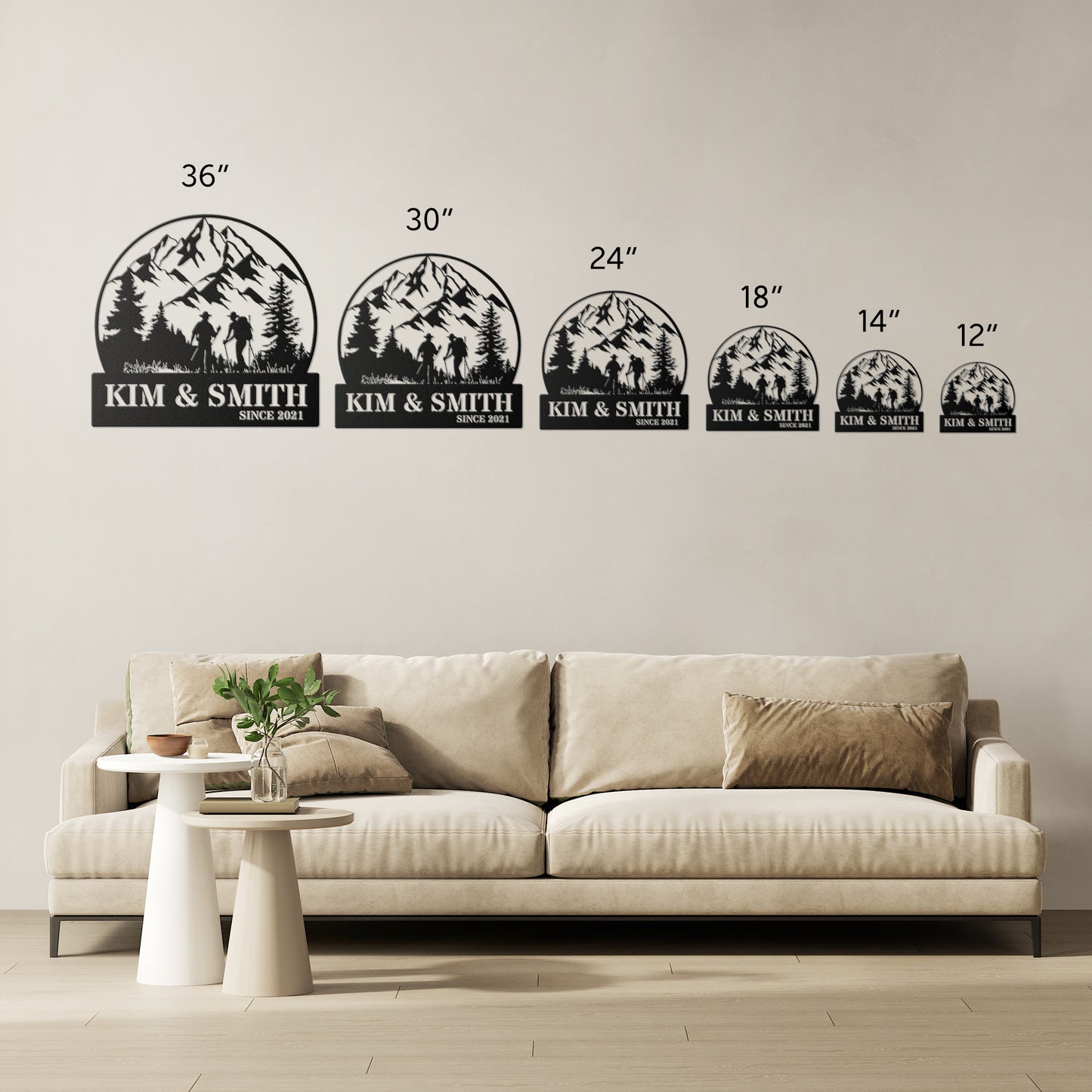 A brick house exterior with a wooden door, arched stained glass, wall-mounted lamp, potted flowers, and an 18 gauge steel decor sign reading "Kim & Smith," featuring the Updated Hiking Couple Metal Art with a mountain and tree silhouette that serves as a timeless piece of home decor.