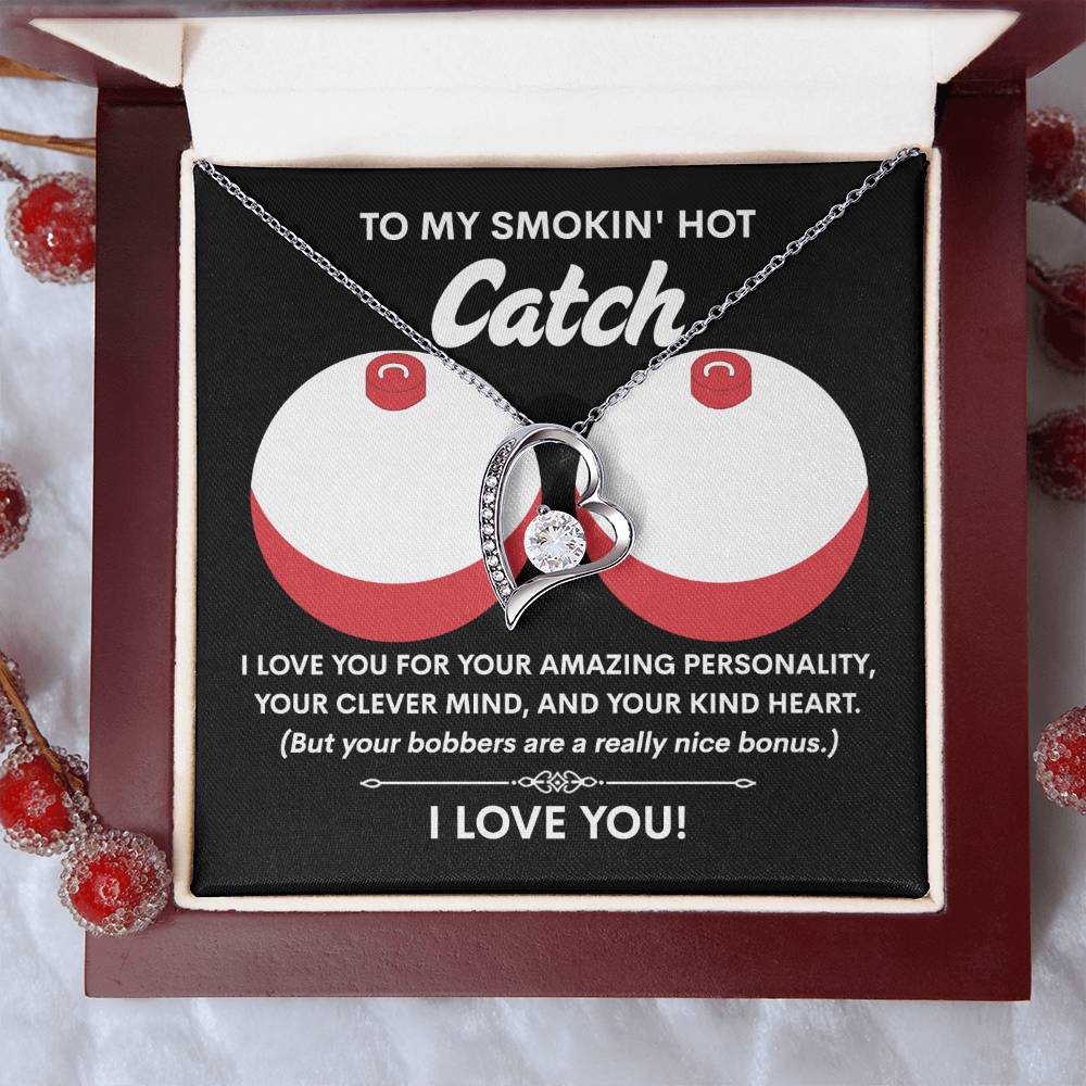 The heart-shaped Soulmate-Nice Bonus - Forever Love Necklace, nestled in an open box with a cheeky love message, is adorned with a 6.5mm CZ crystal and white gold finish—it's the perfect stylish way to express your feelings.