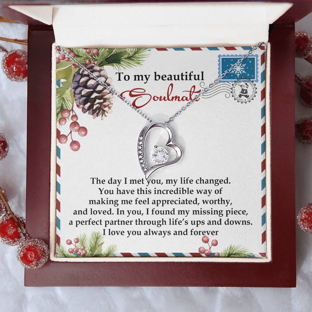 The Soulmate-Perfect Partner - Forever Love Necklace comes in a box adorned with a romantic message titled "To my beautiful soulmate," featuring sparkling cubic zirconia and a radiant white gold finish, all surrounded by a festive design.