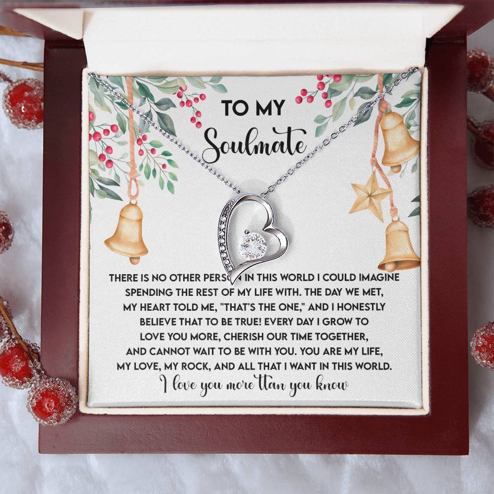 The Soulmate-Be With You - Forever Love Necklace, featuring a heart-shaped pendant and sparkling cubic zirconia, is presented in a gift box decorated with a romantic message. Its sophisticated gold finish is elegantly enhanced by festive adornments, making it an ideal symbol of everlasting love.