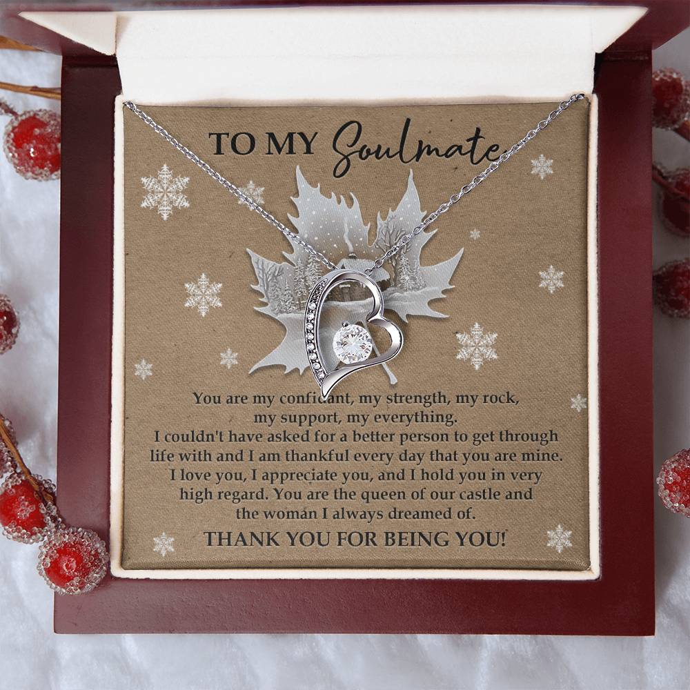 Presented in a gift box, the Soulmate-Our Castle - Forever Love Necklace shines with its stunning cubic zirconia and sophisticated white gold finish, conveying a heartfelt message to your soulmate. Surrounded by delicate snowflakes and berry decorations, it creates the perfect setting for this timeless treasure.